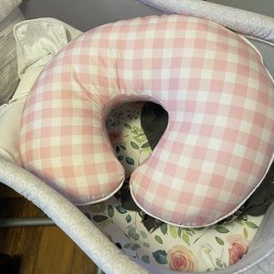 Boppy pillow with pink plaid cover